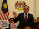 Malaysian Prime Minister Anwar announces cash aid and fuel subsidy reforms amid growing unrest over escalating living expenses.